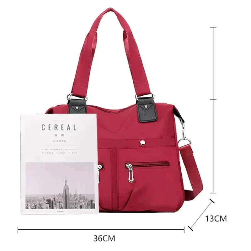 Bolsa Feminina Impermeável Myla (FRETE GRÁTIS)